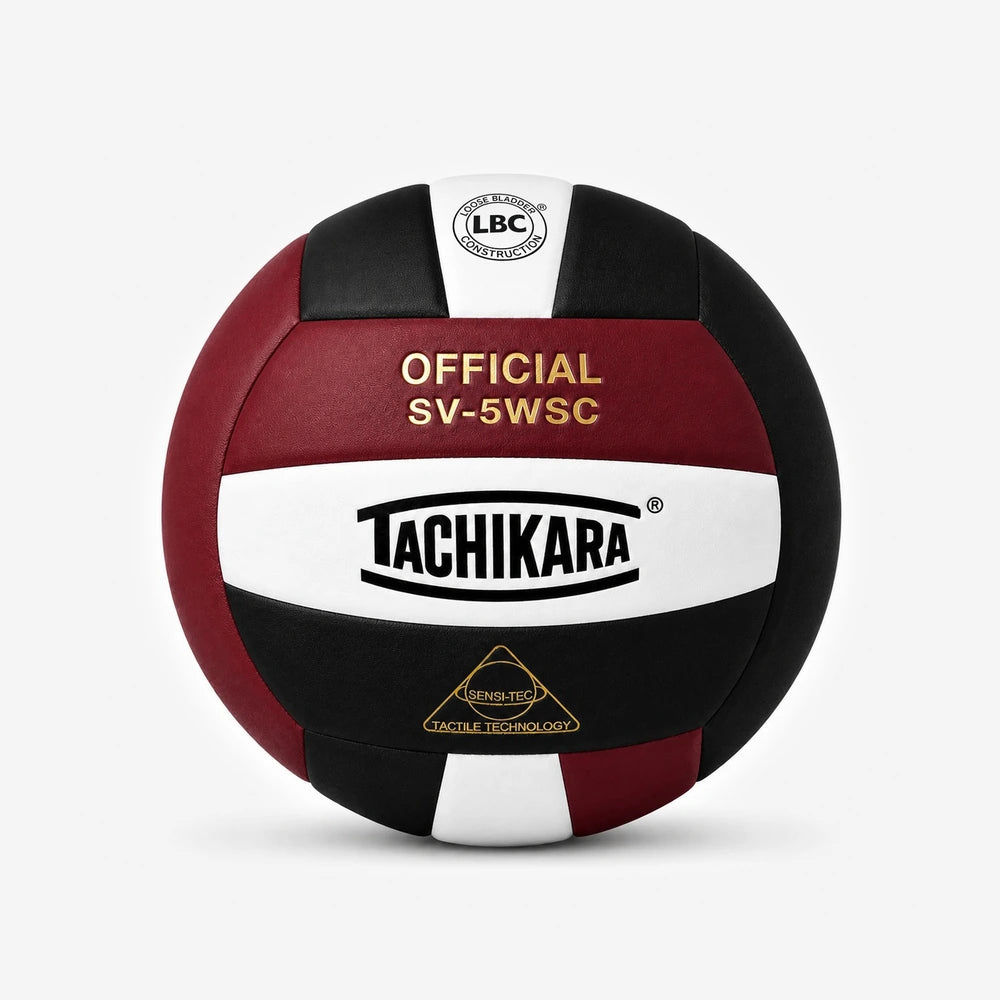 Tachikara volleyball with red, black, and white colors on a light gray background