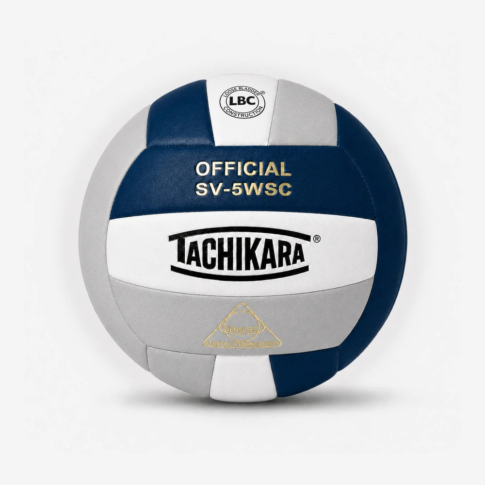 Tachikara volleyball with navy blue, white, and grey colors on a light gray background