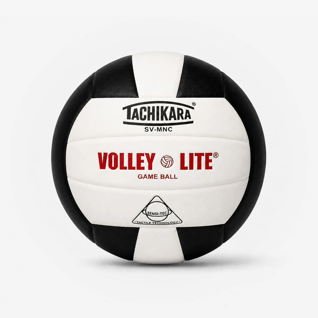 Black and white volleyball with Tachikara branding on a light gray background