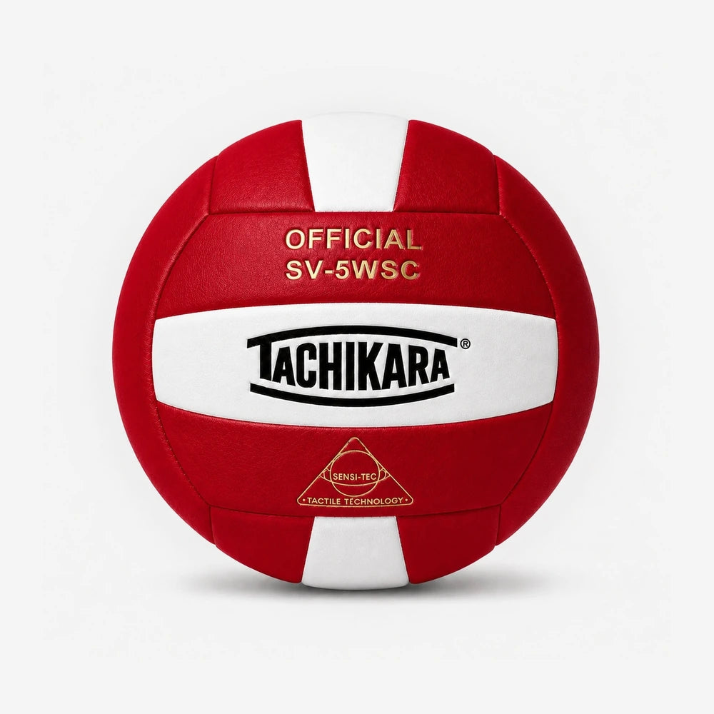 Red and white volleyball with Tachikara branding on a light gray background