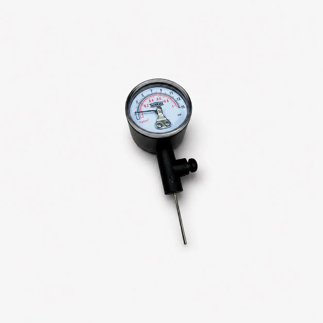 Pressure gauge with needle on a white background