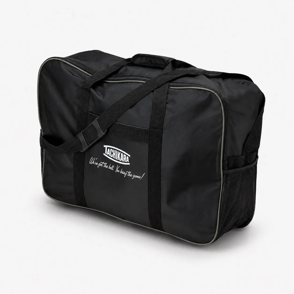 Black duffel bag with tachikara logo on a white background