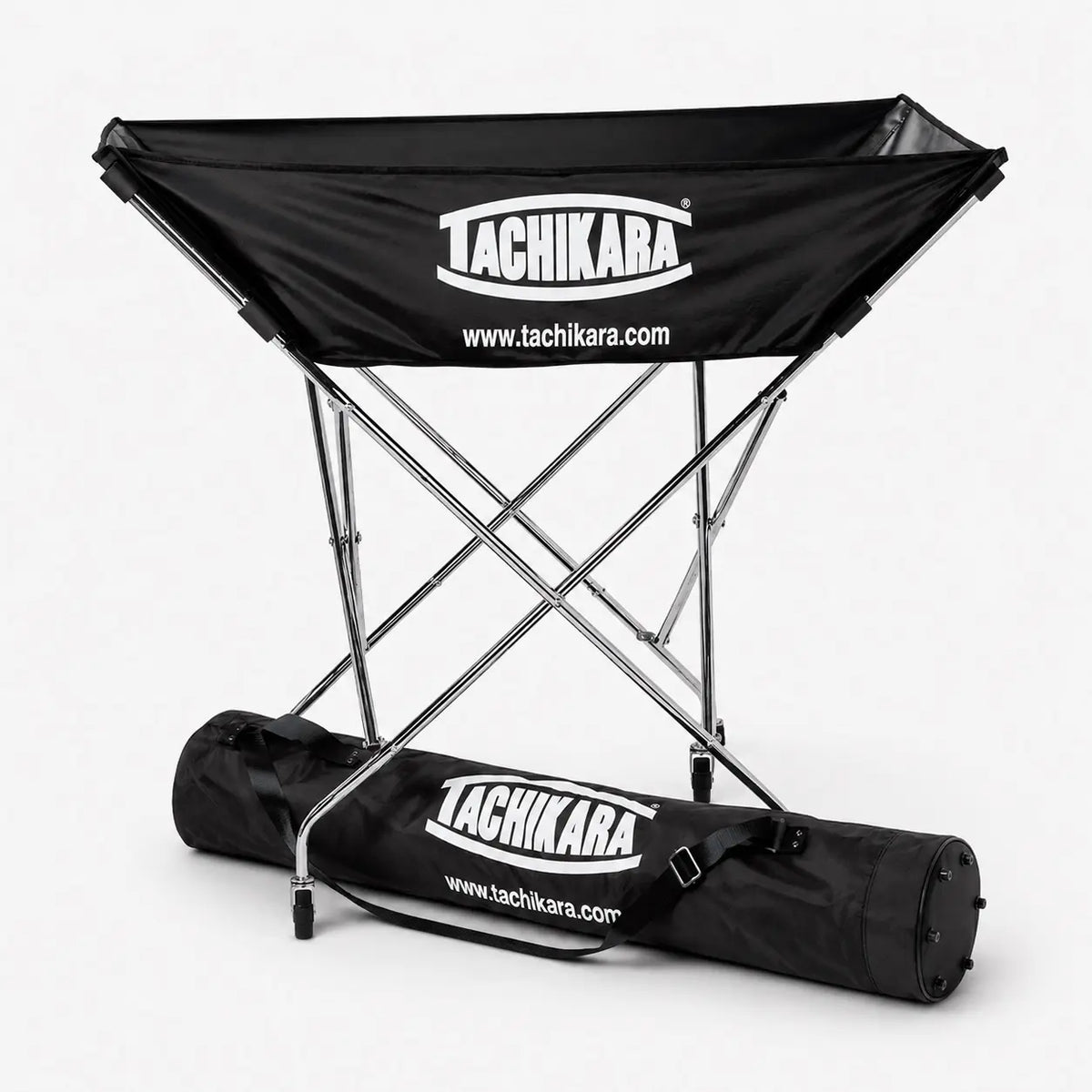 Black folding volleyball hammock with tachikara branding on a white background